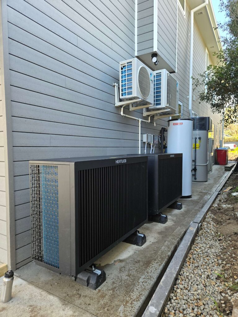 2 x Heatweb Heatpumps in Cascade servicing wall panels over 2 x zones for wall panel Hydronic heating